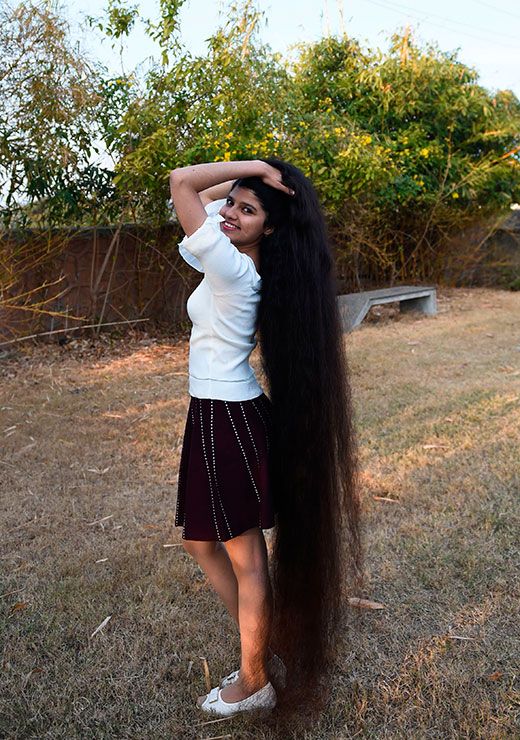 Conheça a adolescente com o cabelo mais comprido do mundo