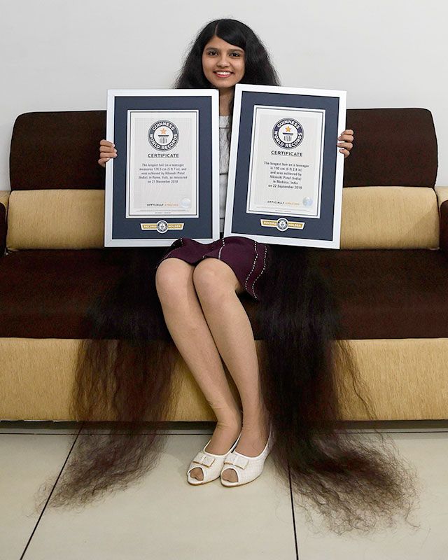 Conheça a adolescente com o cabelo mais comprido do mundo